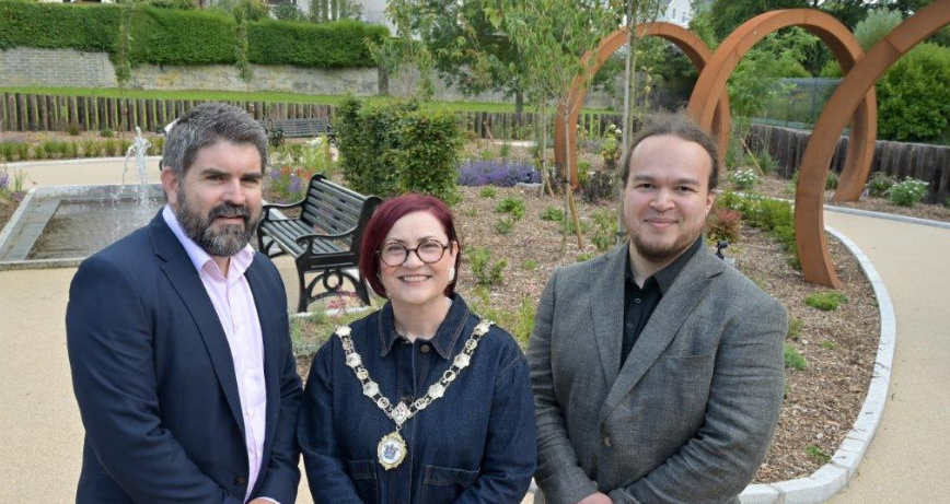 Chris Moore (UKSPF Delivery Manager for NI); Councillor Vicky Moore (Deputy Mayor of Ards and North Down) and Benjamin Ekpenyong (Senior Policy Delivery Officer UKSPF Northern Ireland) in Ward Park, Bangor